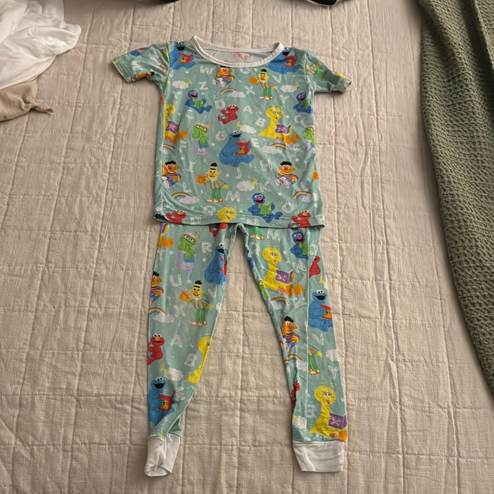 Little Sleepies Blue and Red Pajama Sets with Playful Design